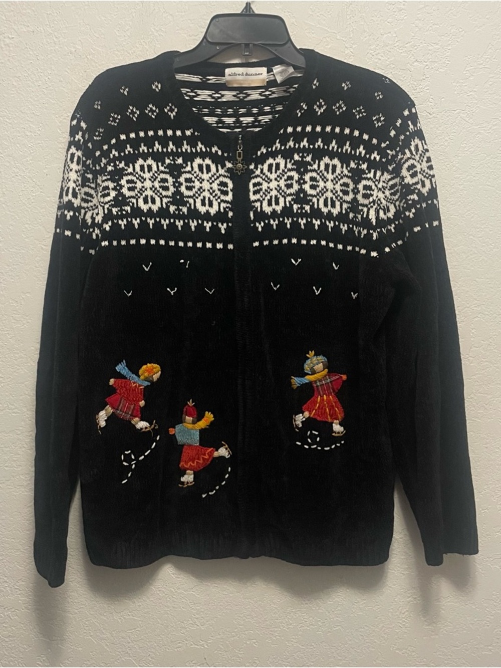 Alfred Dunner Black Zip Cardigan with White Fair Isle and Colorful Ice Skaters